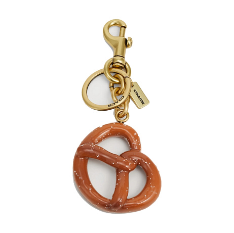 COACH  Klíčenka  Dostupnost: Zalando  Cena: 2 280 Kč