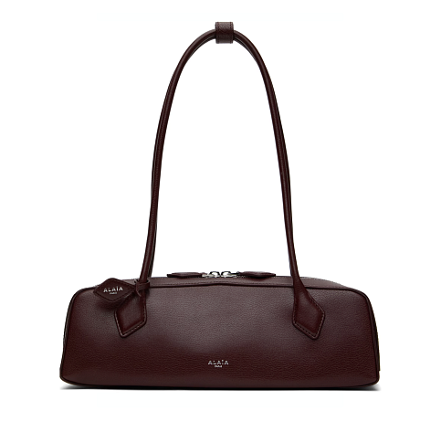 ALAÏA  Burgundy 'Le Teckel' Medium Bag  Dostupnost: Alaïa  Cena: 62 000 Kč